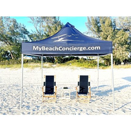 Couples beach package rental on Anna Maria Island with a canopy tent, two beach chairs, side table, and Bluetooth speaker from My Beach Concierge.