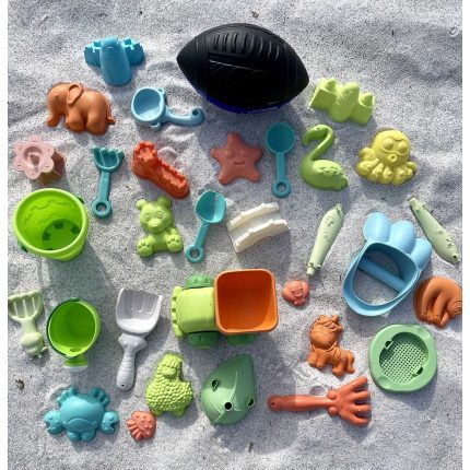 Kids sand toy rental set with bucket, shovel, and molds for beach play in Anna Maria Island, Florida.